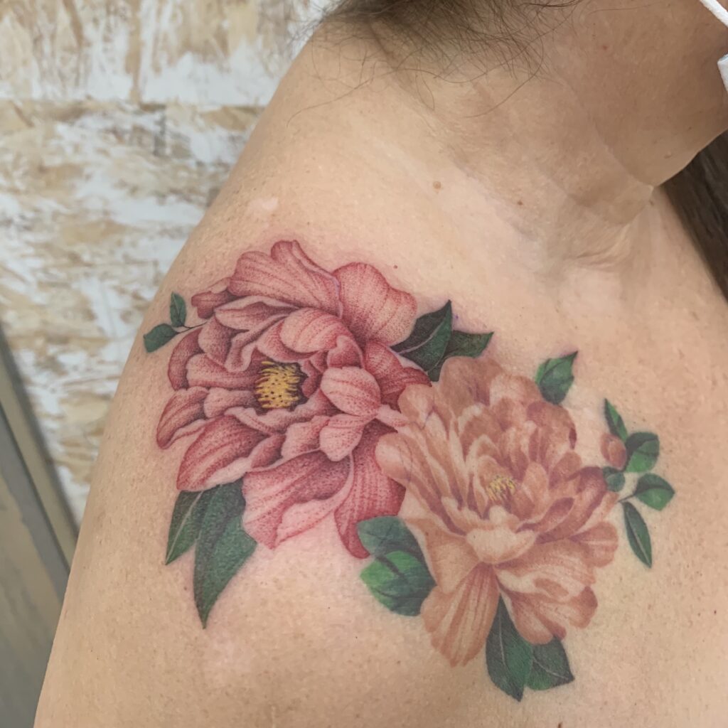 shoulder peonies colored tattoo