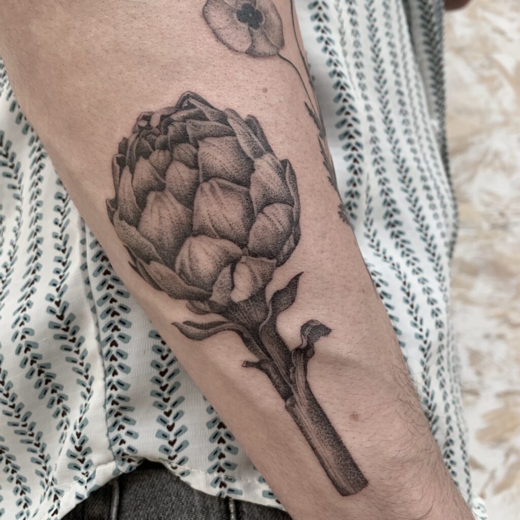 blackwork artichoke tattoo on arm