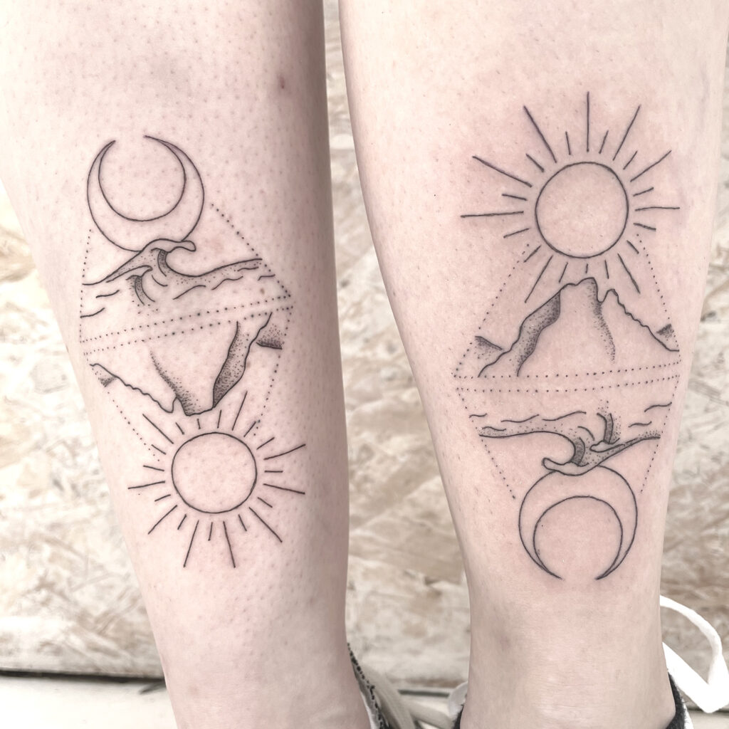 geometric mountain and sea tattoo