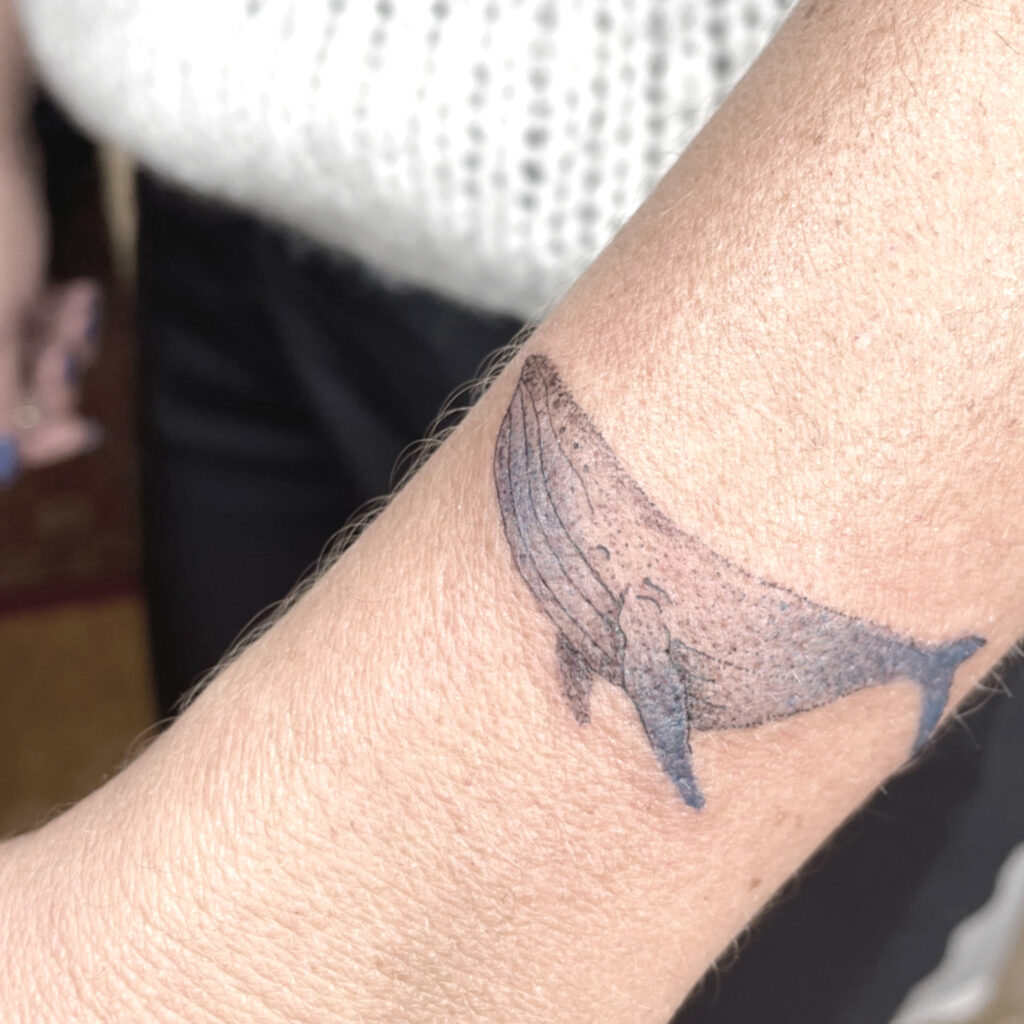 colored whale tattoo